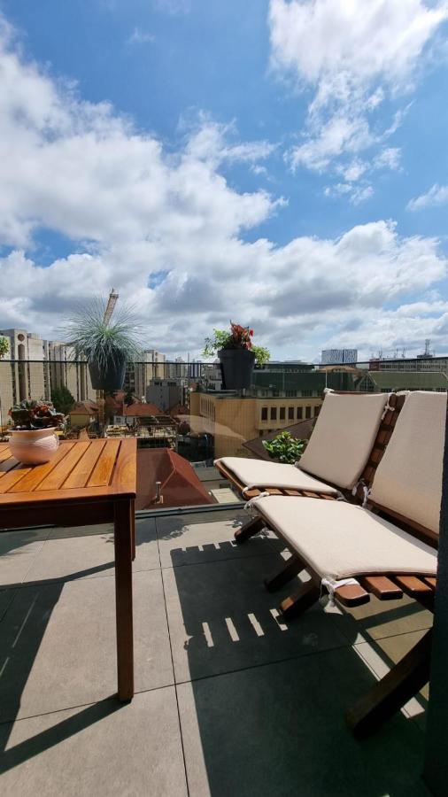 Penthouse Cosmopolit Apartment Brasov Bagian luar foto